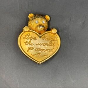 Vintage Avon Teddy Bear "Love Makes the World Go Around" Gold Tone Brooch Pin